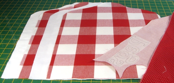 The fabric for a peg bag has been cut out.