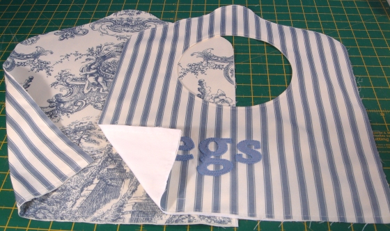 Machine tacking around the edges of your front and back pieces will help when sewing teh layers together. It also helps to avoid confusion with so many layers!