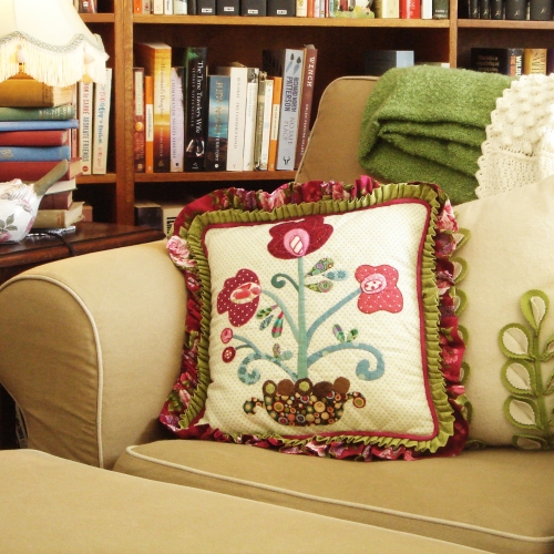 appliquéd and quilted cushion