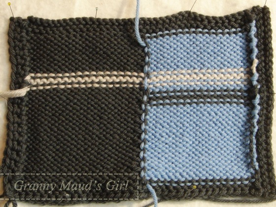 Knitted test swatch, checking intarsia, tension and borders