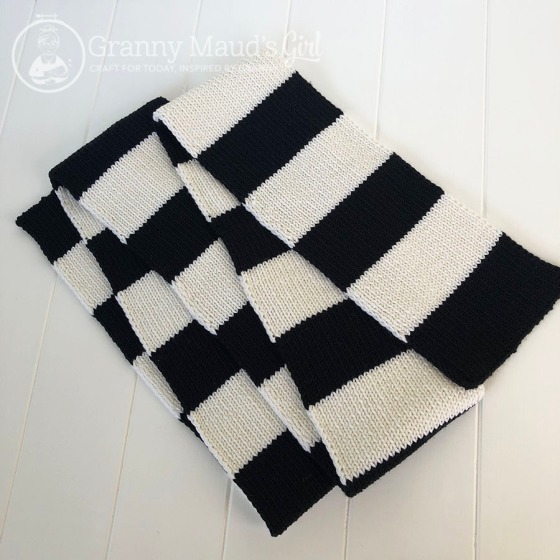 Hand-knitted football scarf